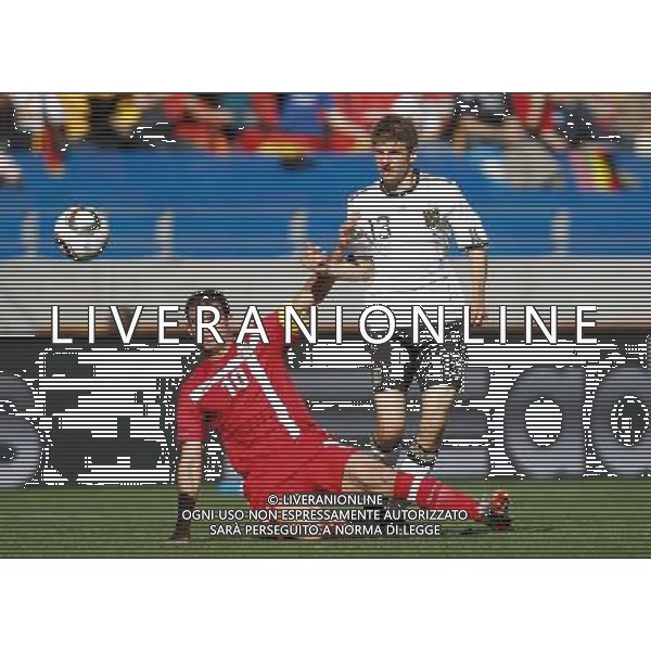 (100618) -- PORT ELIZABETH, June 18, 2010 -- Germany\'s Thomas Muller (R) vies with Serbia\'s Dejan Stankovic during the 2010 World Cup Group D soccer match between Germany and Serbia at the Nelson Mandela Bay stadium in Port Elizabeth, South Africa, on June 18, 2010. Liao Yujie) ©Photoshot/Agenzia Aldo Liverani Sas - ITALY ONLY: GERMANIA - SERBIA FIFA WORLD CUP CAMPIONATI MONDIALI SUD AFRICA 2010