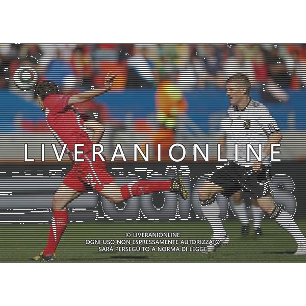 (100618) -- PORT ELIZABETH, June 18, 2010 -- Serbia\'s Zdravko Kuzmanovic (L) heads the ball as Germany\'s Bastian Schweinsteiger watches him during the 2010 World Cup Group D soccer match between Germany and Serbia at the Nelson Mandela Bay stadium in Port Elizabeth, South Africa, on June 18, 2010. Liao Yujie) (zc) ©Photoshot/Agenzia Aldo Liverani Sas - ITALY ONLY: GERMANIA - SERBIA FIFA WORLD CUP CAMPIONATI MONDIALI SUD AFRICA 2010