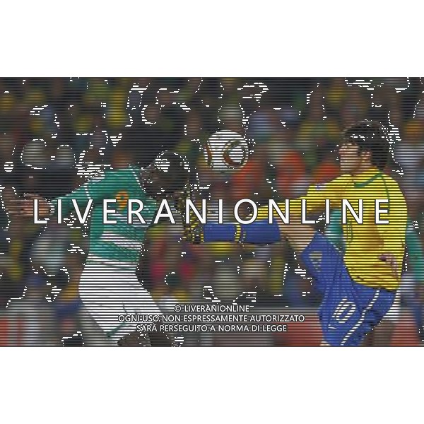Brazil\'s KAKA (R) vies for the ball with Cote d\'Ivoire\'s Ismael TIOTE (L) during the World Cup group G soccer match between Brazil and Cote d\'Ivoire in Johannesburg in South Africa on Sunday, June 20, 2010. Brazil defeated Cote d\'Ivoire 3-1.(Photo By Wei Zheng/ColorChinaPhoto) - Ag. Aldo Liverani sas ITALY ONLY BRASILE - COSTA D\'AVORIO FIFA WORLD CUP CAMPIONATI MONDIALI SUD AFRICA 2010