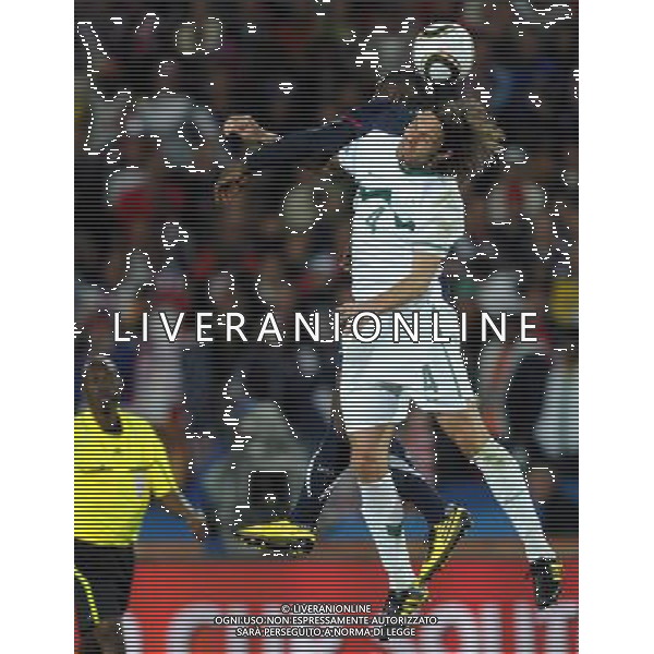 (100618) -- JOHANNESBURG, June 18, 2010 -- Marko Suler (Front) of Slovenia fights for the ball with a player of the United States during the 2010 World Cup Group C soccer match at the Ellis Park stadium in Johannesburg, South Africa, on June 18, 2010. The match ended 2-2. Guo Yong) (zc) ©Photoshot/Agenzia Aldo Liverani Sas - ITALY ONLY: SLOVENIA - STATI UNITI (USA) FIFA WORLD CUP CAMPIONATI MONDIALI SUD AFRICA 2010