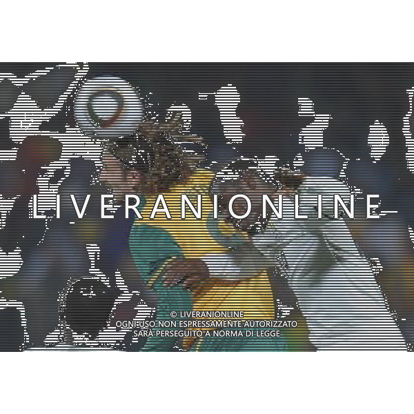 RUSTENBURG(100619) -- RUSTENBURG, June 19, 2010 () -- Ghana\'s Lee Addy (R) vies with Australia\'s Joshua Kennedy during the 2010 World Cup Group D football match at Royal Bafokeng stadium in Rustenburg, South Africa, on June 19, 2010. The match tied 1-1. (/Li Ga)(kh) ©Photoshot/Agenzia Aldo Liverani Sas - ITALY ONLY: GHANA - AUSTRALIA FIFA WORLD CUP CAMPIONATI MONDIALI SUD AFRICA 2010