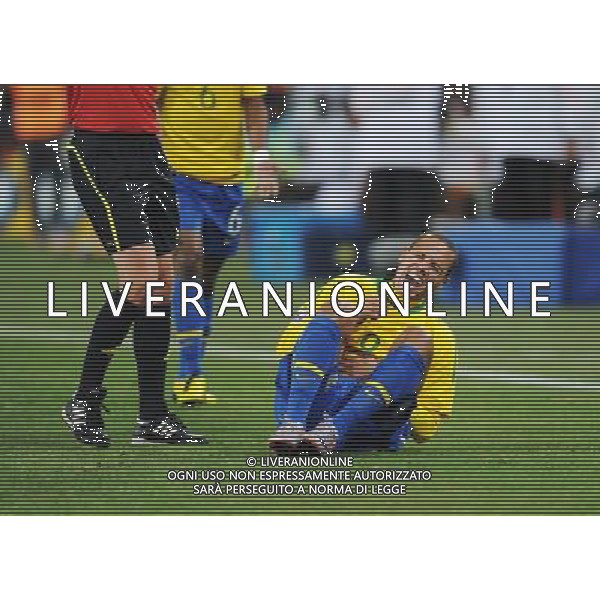 (100621) -- JOHANNESBURG, June 21, 2010 () -- Luis Fabiano of Brazil(R) lies on the ground during the Group G soccer match against Ivory Coast at 2010 FIFA World Cup at Soccer City stadium in Johannesburg, South Africa, on June 20, 2010. Brazil won 3-1. (/Wang Yuguo)(xm) ©Photoshot/Agenzia Aldo Liverani Sas - ITALY ONLY: BRASILE - COSTA D\'AVORIO FIFA WORLD CUP CAMPIONATI MONDIALI SUD AFRICA 2010