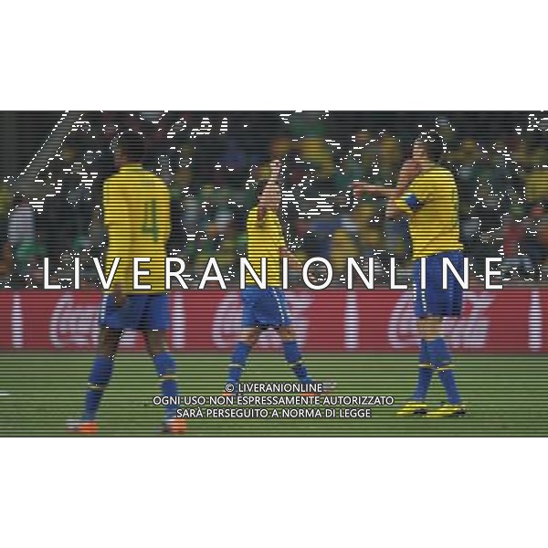 (100621) -- JOHANNESBURG, June 21, 2010 () -- Elano of Brazil(C) celebrates for the goal during the Group G soccer match against Ivory Coast at 2010 FIFA World Cup at Soccer City stadium in Johannesburg, South Africa, on June 20, 2010. Brazil won 3-1. (/Yang Lei)(xm) ©Photoshot/Agenzia Aldo Liverani Sas - ITALY ONLY: BRASILE - COSTA D\'AVORIO FIFA WORLD CUP CAMPIONATI MONDIALI SUD AFRICA 2010