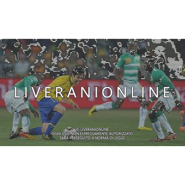 (100621) -- JOHANNESBURG, June 21, 2010 () -- Kaka of Brazil(2nd L) is tightly defended during the Group G soccer match against Ivory Coast at 2010 FIFA World Cup at Soccer City stadium in Johannesburg, South Africa, on June 20, 2010. Brazil won 3-1. (/Yang Lei)(xm) ©Photoshot/Agenzia Aldo Liverani Sas - ITALY ONLY: BRASILE - COSTA D\'AVORIO FIFA WORLD CUP CAMPIONATI MONDIALI SUD AFRICA 2010