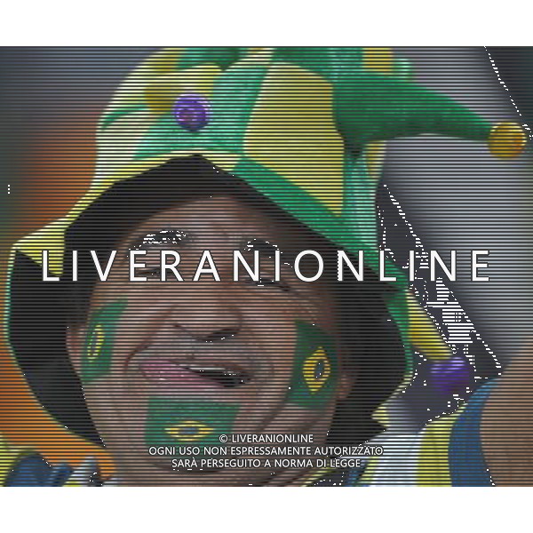 (100621) -- JOHANNESBURG, June 21, 2010 () -- A Brazilian fan grimaces before the Group G soccer match against Ivory Coast at 2010 FIFA World Cup at Soccer City stadium in Johannesburg, South Africa, on June 20, 2010. (/Wang Yuguo)(xm) ©Photoshot/Agenzia Aldo Liverani Sas - ITALY ONLY: BRASILE - COSTA D\'AVORIO FIFA WORLD CUP CAMPIONATI MONDIALI SUD AFRICA 2010
