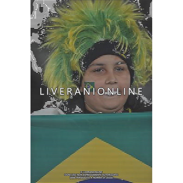(100621) -- JOHANNESBURG, June 21, 2010 () -- A Brazilian supporter makes up like the famous Brazilian soccer star Ronaldo to await before the Group G soccer match against Ivory Coast at 2010 FIFA World Cup at Soccer City stadium in Johannesburg, South Africa, on June 20, 2010. (/Yang Lei)(xm) ©Photoshot/Agenzia Aldo Liverani Sas - ITALY ONLY: BRASILE - COSTA D\'AVORIO FIFA WORLD CUP CAMPIONATI MONDIALI SUD AFRICA 2010