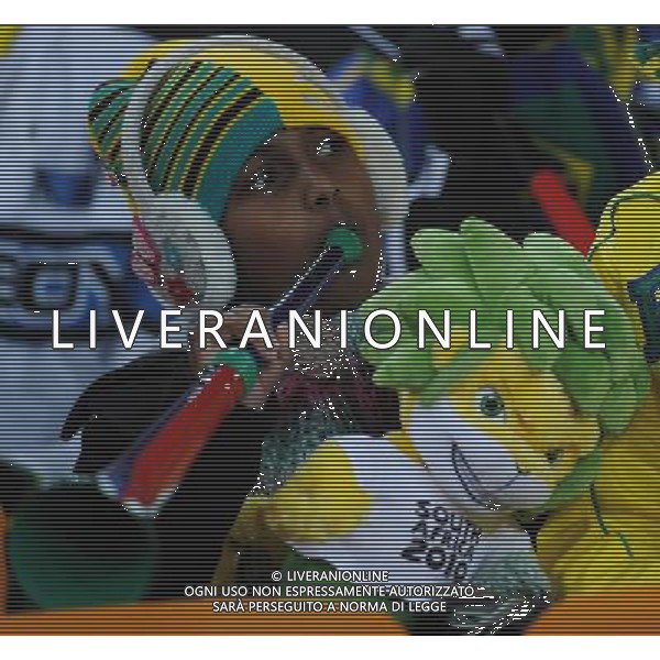 (100621) -- JOHANNESBURG, June 21, 2010 () -- A Brazilian child supporter blows the vuvuzela before the Group G soccer match against Ivory Coast at 2010 FIFA World Cup at Soccer City stadium in Johannesburg, South Africa, on June 20, 2010. (/Wang Yuguo)(xm) ©Photoshot/Agenzia Aldo Liverani Sas - ITALY ONLY: BRASILE - COSTA D\'AVORIO FIFA WORLD CUP CAMPIONATI MONDIALI SUD AFRICA 2010