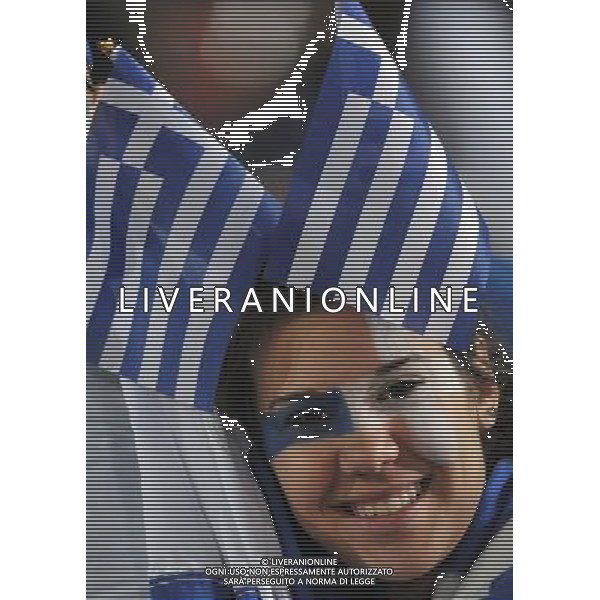 (100623) -- POLOKWANE, June 23, 2010 -- A Greece\'s supporter waits for the start of the 2010 World Cup Group B soccer match between Argentina and Greece in Polokwane, South Africa, June 22, 2010. Xu Suhui) ©Photoshot/Agenzia Aldo Liverani Sas - ITALY ONLY: ARGENTINA - GRECIA FIFA WORLD CUP CAMPIONATI MONDIALI SUD AFRICA 2010