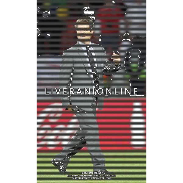 (100623) -- PORT ELIZABETH, June 23, 2010 -- England\'s coach Fabio Capello walks into the field after the 2010 World Cup Group C soccer match against Slovenia at Nelson Mandela Bay stadium in Port Elizabeth, South Africa, June 23, 2010. England won 1-0. Xing Guangli) (kh) ©Photoshot/Agenzia Aldo Liverani Sas - ITALY ONLY: INGHILTERRA - SLOVENIA FIFA WORLD CUP CAMPIONATI MONDIALI SUD AFRICA 2010