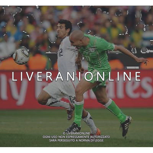 (100623) -- TSHWANE, June 23, 2010 -- Jonathan Bornstein (L) the United States vies with Algeria\'s Rafik Djebbour during the 2010 World Cup Group C soccer match at Loftus Versfeld stadium in Tshwane, South Africa, June 23, 2010. Guo Yong) (kh) ©Photoshot/Agenzia Aldo Liverani Sas - ITALY ONLY: STATI UNITI (USA) - ALGERIA FIFA WORLD CUP CAMPIONATI MONDIALI SUD AFRICA 2010