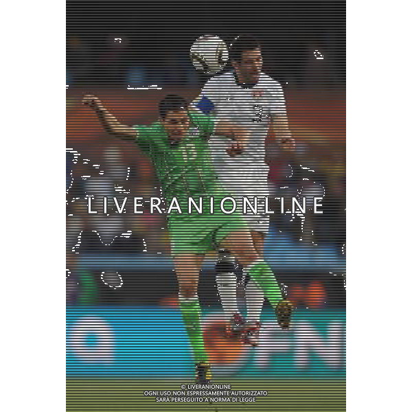 (100623) -- TSHWANE, June 23, 2010 -- Carlos Bocanegra (Top) the United States vies with Algeria\'s Karim Matmour during the 2010 World Cup Group C soccer match at Loftus Versfeld stadium in Tshwane, South Africa, June 23, 2010. Guo Yong) (kh) ©Photoshot/Agenzia Aldo Liverani Sas - ITALY ONLY: STATI UNITI (USA) - ALGERIA FIFA WORLD CUP CAMPIONATI MONDIALI SUD AFRICA 2010
