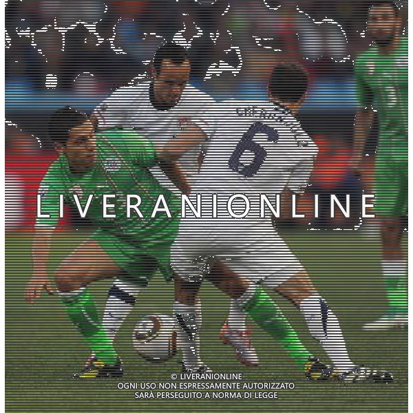 (100623) -- TSHWANE, June 23, 2010 -- Algeria\'s Karim Matmour (C) vies for the ball during the 2010 World Cup Group C soccer match against the United States at Loftus Versfeld stadium in Tshwane, South Africa, June 23, 2010. Guo Yong) (kh) ©Photoshot/Agenzia Aldo Liverani Sas - ITALY ONLY: STATI UNITI (USA) - ALGERIA FIFA WORLD CUP CAMPIONATI MONDIALI SUD AFRICA 2010