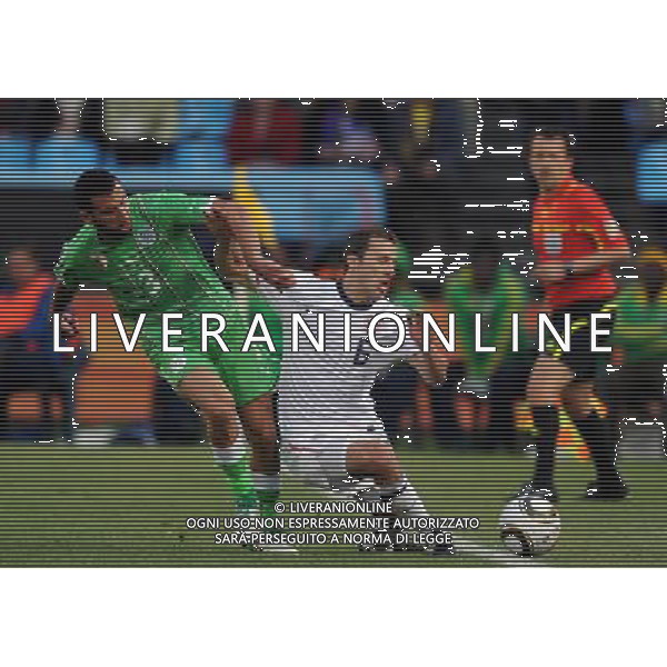 (100623) -- TSHWANE, June 23, 2010 -- Steve Cherundolo (R) of the United States vies with Algeria\'s Nadir Belhadj during the 2010 World Cup Group C soccer match at Loftus Versfeld stadium in Tshwane, South Africa, June 23, 2010. Guo Yong) (kh) ©Photoshot/Agenzia Aldo Liverani Sas - ITALY ONLY: STATI UNITI (USA) - ALGERIA FIFA WORLD CUP CAMPIONATI MONDIALI SUD AFRICA 2010