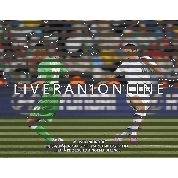 (100623) -- TSHWANE, June 23, 2010 -- Landon Donovan (R) of the United States vies for the ball during the 2010 World Cup Group C soccer match against Algeria at Loftus Versfeld stadium in Tshwane, South Africa, June 23, 2010. Guo Yong) (kh) ©Photoshot/Agenzia Aldo Liverani Sas - ITALY ONLY: STATI UNITI (USA) - ALGERIA FIFA WORLD CUP CAMPIONATI MONDIALI SUD AFRICA 2010