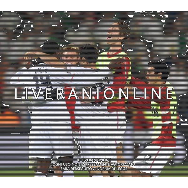 (100623) -- TSHWANE, June 23, 2010 -- Players of the United States celebrate winning the 2010 World Cup Group C soccer match against Algeria at Loftus Versfeld stadium in Tshwane, South Africa, June 23, 2010. The United States won 1-0. Guo Yong) (kh) ©Photoshot/Agenzia Aldo Liverani Sas - ITALY ONLY: STATI UNITI (USA) - ALGERIA FIFA WORLD CUP CAMPIONATI MONDIALI SUD AFRICA 2010
