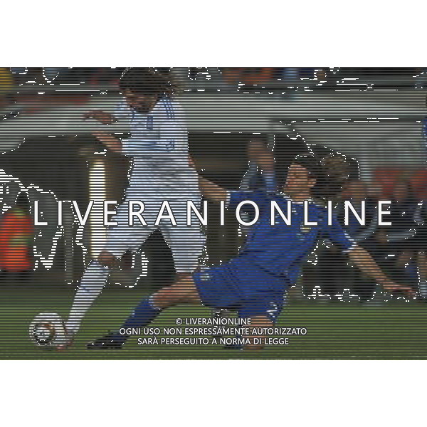 (100623) -- POLOKWANE, June 23, 2010 () -- Georgios Samaras of Greece (L) vies with Martin Demichelis of Argentina during their 2010 World Cup Group B soccer match in Polokwane, South Africa, June 22, 2010. Argentina won 2-0 and qualifies for the next round.(/Xu Suhui)(fym) ©Photoshot/Agenzia Aldo Liverani Sas - ITALY ONLY: ARGENTINA - GRECIA FIFA WORLD CUP CAMPIONATI MONDIALI SUD AFRICA 2010