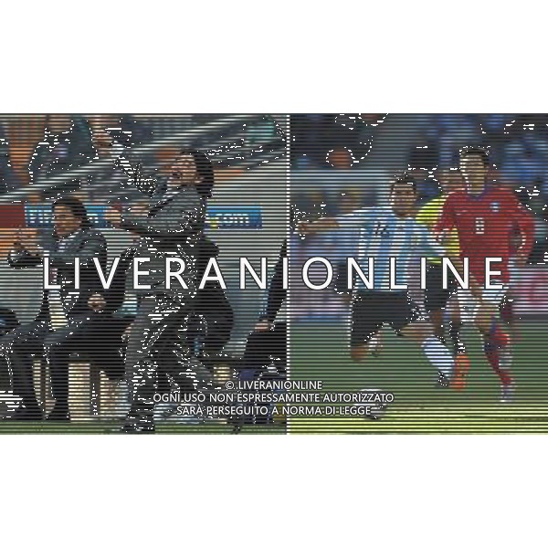(100623) -- June 23, 2010 () --the combo picture shows Argentina\'s coach Diego Maradona (L) and his son-in-law Sergio Aguero act during their World Cup Group B match against South Korea, June 17, 2010. Sergio Aguero proves himself not just son-in-law to Diego Maradona in the 2010 World Cup. Though he was not one of the starting line-up during the Group B match against South Korea, he racked up two assists to Gonzalo Higuain during the second half. () ©Photoshot/Agenzia Aldo Liverani Sas - ITALY ONLY: ARGENTINA - GRECIA FIFA WORLD CUP CAMPIONATI MONDIALI SUD AFRICA 2010