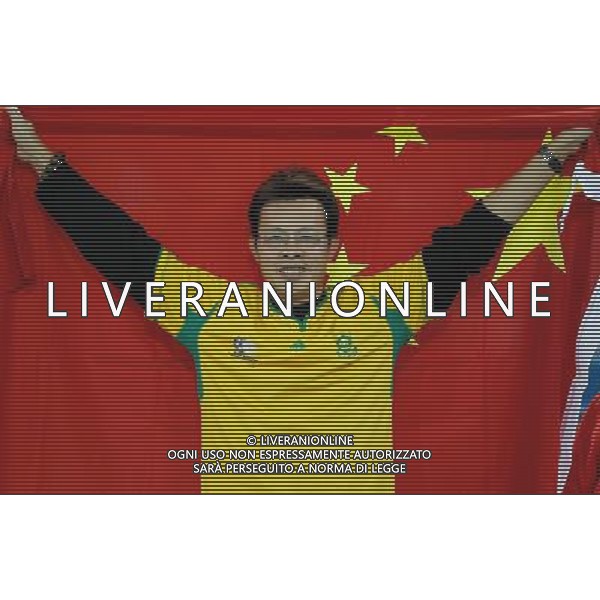 (100623) -- DURBAN, June 23, 2010 -- A Chinese fan living in Durban cheers prior to the 2010 World Cup Group B soccer match between Nigeria and South Korea at Moses Mabhida stadium in Durban, South Africa, on June 22, 2010. Liao Yujie)(fym) ©Photoshot/Agenzia Aldo Liverani Sas - ITALY ONLY - NIGERIA - COREA DEL SUD FIFA WORLD CUP CAMPIONATI MONDIALI SUD AFRICA 2010