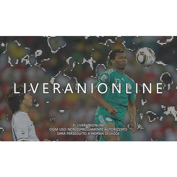 (100623) -- DURBAN, June 23, 2010 -- Nigeria\'s Kalu Uche (R) heads the ball during the 2010 World Cup Group B soccer match against South Korea at Moses Mabhida stadium in Durban, South Africa, on June 22, 2010. Liao Yujie)(dl) ©Photoshot/Agenzia Aldo Liverani Sas - ITALY ONLY - NIGERIA - COREA DEL SUD FIFA WORLD CUP CAMPIONATI MONDIALI SUD AFRICA 2010