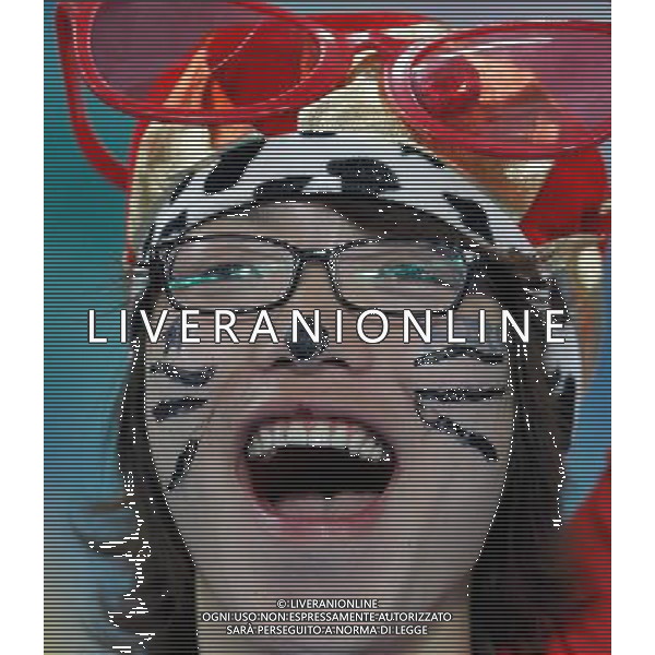 (100623) -- DURBAN, June 23, 2010 -- A fan of South Korea cheers prior to the 2010 World Cup Group B soccer match between Nigeria and South Korea at Moses Mabhida stadium in Durban, South Africa, on June 22, 2010. Liao Yujie)(fym) ©Photoshot/Agenzia Aldo Liverani Sas - ITALY ONLY - NIGERIA - COREA DEL SUD FIFA WORLD CUP CAMPIONATI MONDIALI SUD AFRICA 2010