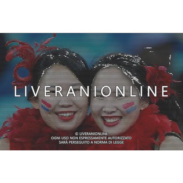 (100623) -- DURBAN, June 23, 2010 -- Two fans of South Korea cheer prior to the 2010 World Cup Group B soccer match between Nigeria and South Korea at Moses Mabhida stadium in Durban, South Africa, on June 22, 2010. Liao Yujie)(fym) ©Photoshot/Agenzia Aldo Liverani Sas - ITALY ONLY - NIGERIA - COREA DEL SUD FIFA WORLD CUP CAMPIONATI MONDIALI SUD AFRICA 2010