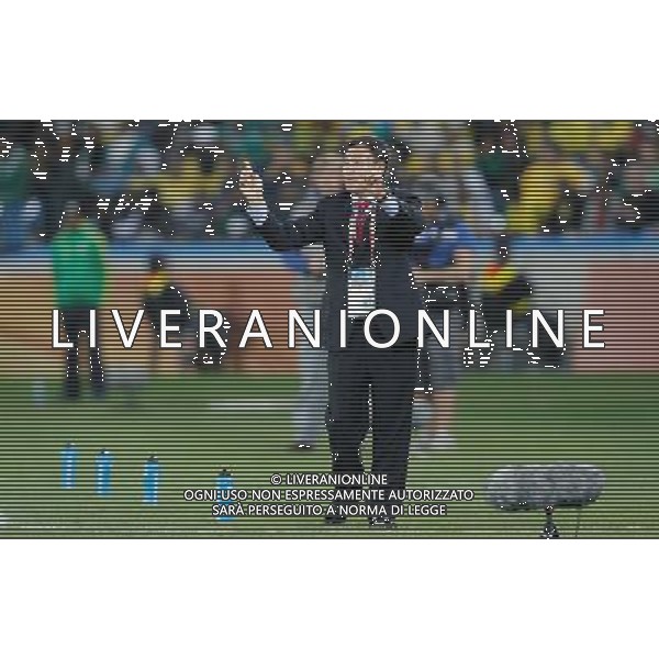 (100623) -- DURBAN, June 23, 2010 () -- Huh Jung-Moo, head coach of South Korea, reacts during the 2010 World Cup Group B soccer match against Nigeria at Moses Mabhida stadium in Durban, South Africa, on June 22, 2010. The match tied 2-2.(/Liao Yujie)(dl) ©Photoshot/Agenzia Aldo Liverani Sas - ITALY ONLY - NIGERIA - COREA DEL SUD FIFA WORLD CUP CAMPIONATI MONDIALI SUD AFRICA 2010