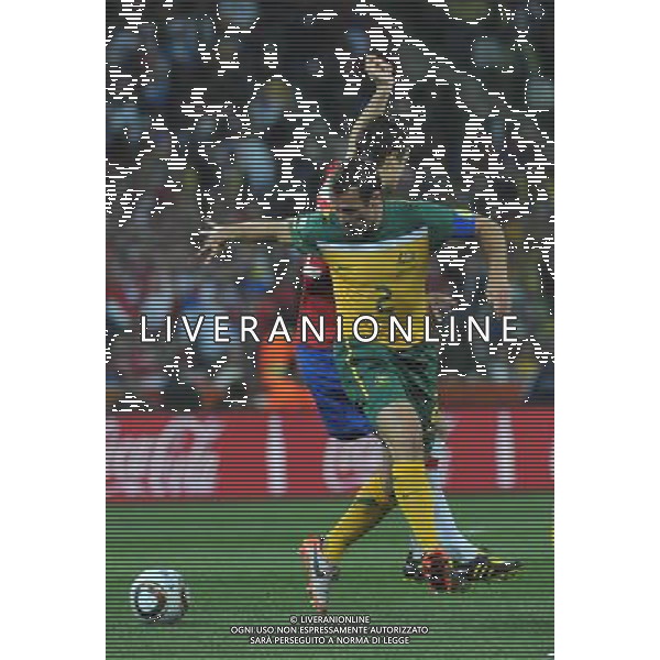 (100624) -- NELSPRUIT, June 24, 2010 -- Australia\'s Lucas Neill (R) vies for the ball during the 2010 World Cup Group D match between Australia and Serbia in Nelspruit, South Africa, June 23, 2010. Xu Suhui) ©Photoshot/Agenzia Aldo Liverani Sas - ITALY ONLY: SERBIA - AUSTRALIA FIFA WORLD CUP CAMPIONATI MONDIALI SUD AFRICA 2010