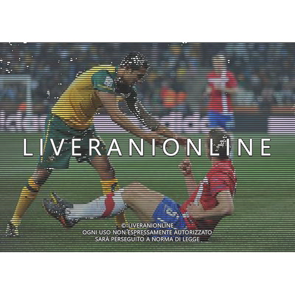 (100624) -- NELSPRUIT, June 24, 2010 () -- Australia\'s Tim Cahill (L) and Serbia\'s Nemanja Vidic react during the 2010 World Cup Group D match in Nelspruit, South Africa, June 23, 2010. Australia won the match 2-1. Both Serbia and Australia are disqualified for the round of 16. (/Xu Suhui) ©Photoshot/Agenzia Aldo Liverani Sas - ITALY ONLY: SERBIA - AUSTRALIA FIFA WORLD CUP CAMPIONATI MONDIALI SUD AFRICA 2010