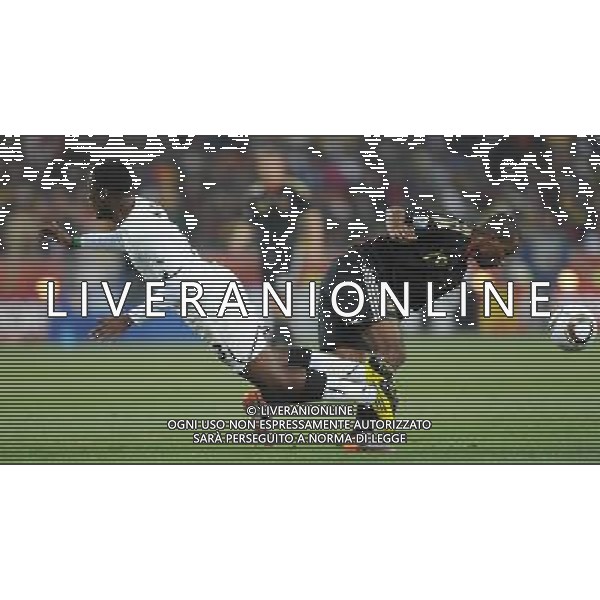 (100624) -- JOHANNESBURG, June 24, 2010 -- Germany\'s Cacau (R) vies with Ghana\'s Asamoah Gyan during the 2010 World Cup Group D match in Johannesburg, South Africa, June 23, 2010. Li Ga) ©Photoshot/Agenzia Aldo Liverani Sas - ITALY ONLY - GHANA - GERMANIA FIFA WORLD CUP CAMPIONATI MONDIALI SUD AFRICA 2010