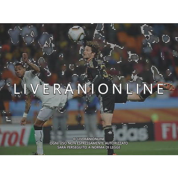 (100624) -- JOHANNESBURG, June 24, 2010 -- Germany\'s Arne Friedrich (R) vies with Ghana\'s Kevin Prince Boateng during the 2010 World Cup Group D match in Johannesburg, South Africa, June 23, 2010. Li Ga) ©Photoshot/Agenzia Aldo Liverani Sas - ITALY ONLY - GHANA - GERMANIA FIFA WORLD CUP CAMPIONATI MONDIALI SUD AFRICA 2010