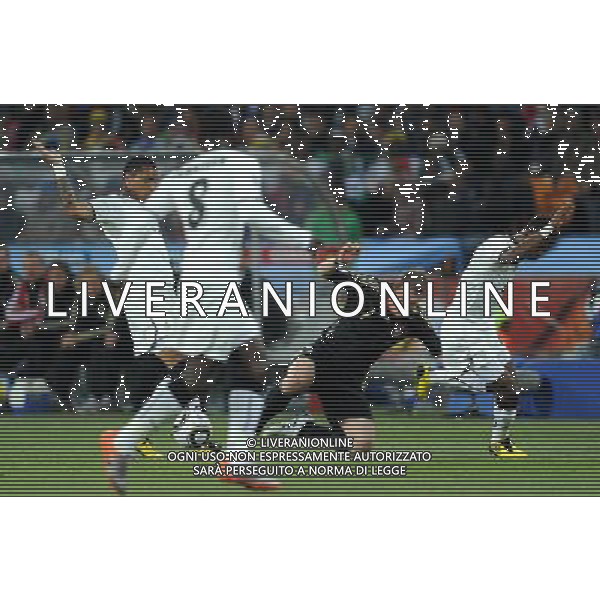 (100624) -- JOHANNESBURG, June 24, 2010 -- Germany\'s Bastian Schweinsteiger (R2) falls over during the 2010 World Cup Group D match against Ghana in Johannesburg, South Africa, June 23, 2010. Wang Yuguo) ©Photoshot/Agenzia Aldo Liverani Sas - ITALY ONLY - GHANA - GERMANIA FIFA WORLD CUP CAMPIONATI MONDIALI SUD AFRICA 2010