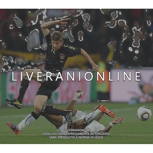 (100624) -- JOHANNESBURG, June 24, 2010 -- Germany\'s Thomas Muller (L) vies for the ball during the 2010 World Cup Group D match between Germany and Ghana in Johannesburg, South Africa, June 23, 2010. Wang Yuguo) ©Photoshot/Agenzia Aldo Liverani Sas - ITALY ONLY - GHANA - GERMANIA FIFA WORLD CUP CAMPIONATI MONDIALI SUD AFRICA 2010