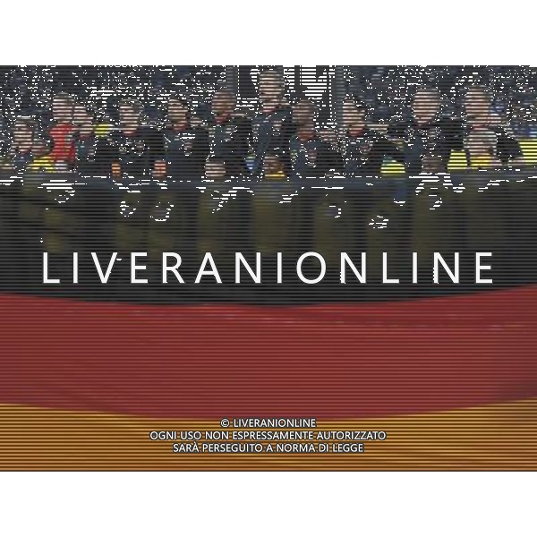 (100624) -- JOHANNESBURG, June 24, 2010 () -formazione germania schierata durante l\'inno nazionale- Germany\'s players listen to the national anthem before the 2010 World Cup Group D match against Serbia in Johannesburg, South Africa, June 23, 2010. Germany won the match 1-0. Both Germany and Ghana are qualified for the round of 16. (/Li Ga) ©Photoshot/Agenzia Aldo Liverani Sas - ITALY ONLY - GHANA - GERMANIA FIFA WORLD CUP CAMPIONATI MONDIALI SUD AFRICA 2010