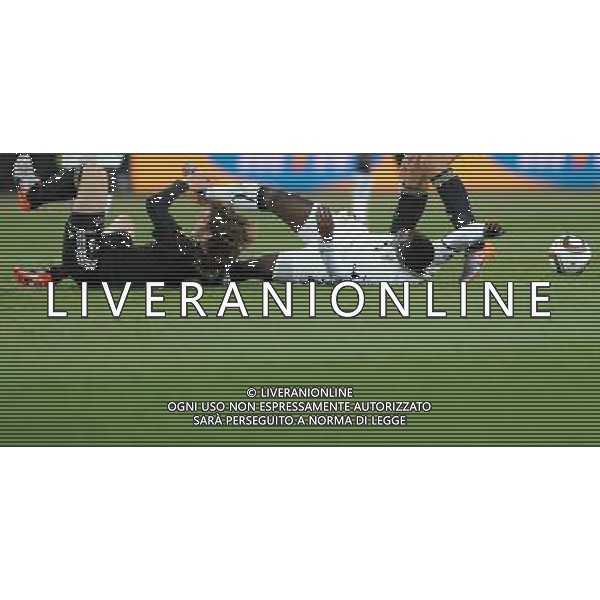 (100624) -- JOHANNESBURG, June 24, 2010 () -- Germany\'s Arne Friedrich (L) vies with Ghana\'s Kwadwo Asamoah during the 2010 World Cup Group D match in Johannesburg, South Africa, June 23, 2010. Germany won the match 1-0. Both Germany and Ghana are qualified for the round of 16. (/Li Ga) ©Photoshot/Agenzia Aldo Liverani Sas - ITALY ONLY - GHANA - GERMANIA FIFA WORLD CUP CAMPIONATI MONDIALI SUD AFRICA 2010