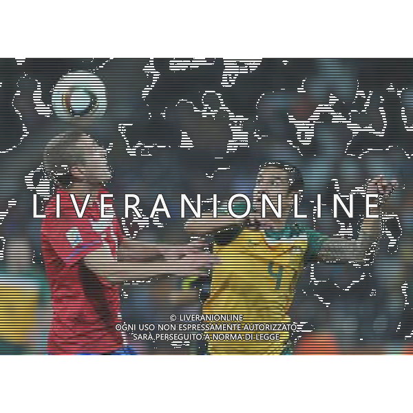 (100624) -- NELSPRUIT, June 24, 2010 () -- Australia\'s Tim Cahill (R) vies with Serbia\'s Nemanja Vidic during the 2010 World Cup Group D match in Nelspruit, South Africa, June 23, 2010. Australia won the match 2-1. Both Serbia and Australia are disqualified for the round of 16. (/Xu Suhui) ©Photoshot/Agenzia Aldo Liverani Sas - ITALY ONLY: AUSTRALIA - SERBIA FIFA WORLD CUP CAMPIONATI MONDIALI SUD AFRICA 2010