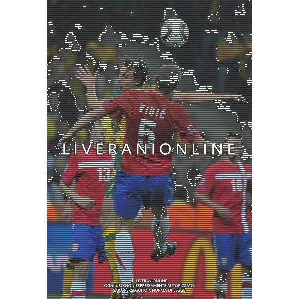 (100624) -- NELSPRUIT, June 24, 2010 () -- Serbia\'s Nemanja Vidic (front) vies for the ball during the 2010 World Cup Group D match against Australia in Nelspruit, South Africa, June 23, 2010. Serbia lost to Australia 1-2. Both Serbia and Australia are disqualified for the round of 16. (/Xu Suhui) ©Photoshot/Agenzia Aldo Liverani Sas - ITALY ONLY: AUSTRALIA - SERBIA FIFA WORLD CUP CAMPIONATI MONDIALI SUD AFRICA 2010