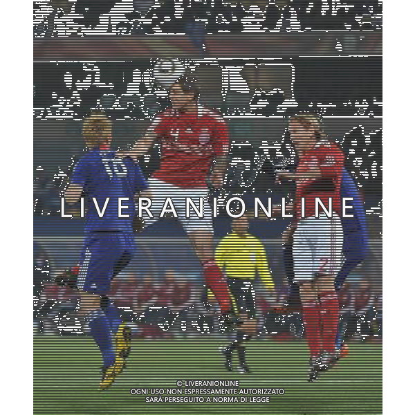 (100625) -- RUSTENBURG, June 25, 2010 -- Daniel Agger (2nd L) of Denmark heads the ball during the Group E last round match between Denmark and Japan at 2010 FIFA World Cup, at Royal Bafokeng stadium in Rustenburg, South Africa, on June 24, 2010. Xu Suhui) (dl) ©Photoshot/Agenzia Aldo Liverani Sas - ITALY ONLY: DANIMARCA - GIAPPONE FIFA WORLD CUP CAMPIONATI MONDIALI SUD AFRICA 2010