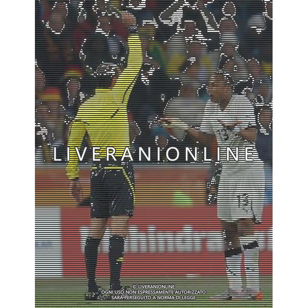 (100624) -- JOHANNESBURG, June 24, 2010 () -- Ghana\'s Andre Ayew (R) is given a yellow card during the 2010 World Cup Group D match against Germany in Johannesburg, South Africa, June 23, 2010. Germany won the match 1-0. Both Germany and Ghana are qualified for the round of 16. (/Li Ga) ©Photoshot/Agenzia Aldo Liverani Sas - ITALY ONLY: GERMANIA - GHANA FIFA WORLD CUP CAMPIONATI MONDIALI SUD AFRICA 2010