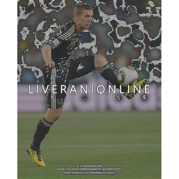 (100624) -- JOHANNESBURG, June 24, 2010 () -- Germany\'s Lukas Podolski stops the ball during the 2010 World Cup Group D match against Ghana in Johannesburg, South Africa, June 23, 2010. Germany won the match 1-0. Both Germany and Ghana are qualified for the round of 16. (/Li Ga) ©Photoshot/Agenzia Aldo Liverani Sas - ITALY ONLY: GERMANIA - GHANA FIFA WORLD CUP CAMPIONATI MONDIALI SUD AFRICA 2010