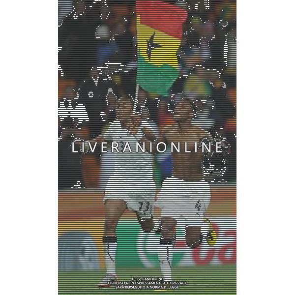 (100624) -- JOHANNESBURG, June 24, 2010 () -- Ghana\'s John Pantsil (R) and Andre Ayew celebrate after the 2010 World Cup Group D match between Germany and Ghana in Johannesburg, South Africa, June 23, 2010. Germany won the match 1-0. Both Germany and Ghana are qualified for the round of 16. (/Li Ga) ©Photoshot/Agenzia Aldo Liverani Sas - ITALY ONLY: GERMANIA - GHANA FIFA WORLD CUP CAMPIONATI MONDIALI SUD AFRICA 2010