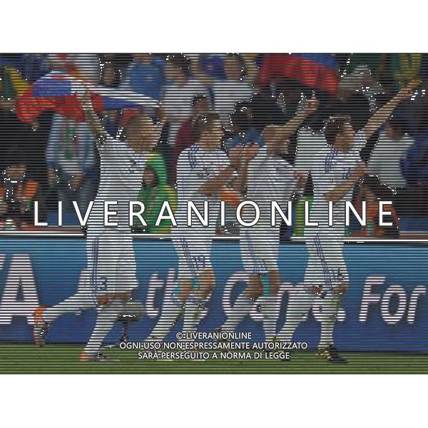 (100624) -- JOHANNESBURG, June 24, 2010 -- Slovakia\'s players celebrate after the 2010 World Cup Group F soccer match against Italy at Ellis Park stadium in Johannesburg, South Africa, June 24, 2010. Slovakia won 3-2 and progressed to the next round. Guo Yong) (kh) ©Photoshot/Agenzia Aldo Liverani Sas - ITALY ONLY: SLOVACCHIA - ITALIA FIFA WORLD CUP CAMPIONATI MONDIALI SUD AFRICA 2010