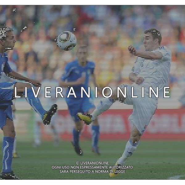 (100624) -- JOHANNESBURG, June 24, 2010 -- Italy\'s Domenico Criscito (L) vies with Slovakia\'s Erik Jendrisek during the 2010 World Cup Group F soccer match at Ellis Park stadium in Johannesburg, South Africa, June 24, 2010. Guo Yong) (kh) ©Photoshot/Agenzia Aldo Liverani Sas - ITALY ONLY: SLOVACCHIA - ITALIA FIFA WORLD CUP CAMPIONATI MONDIALI SUD AFRICA 2010