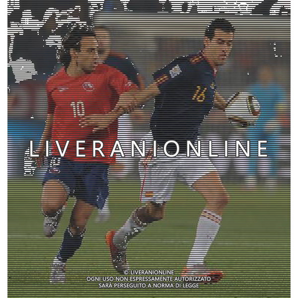 Fifa World Cup Sud Africa 2010 Match #47 Tshwane/Pretoria (Lotus Versfeld Stadium) - 25.06.2010 Cile-Spagna Nella Foto:busquets-valdivia /Ph.Vitez-Ag. Aldo Liverani