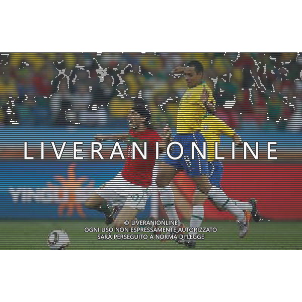 (100625) -- DURBAN, June 25, 2010 -- Brazil\'s Gilberto Silva (R) vies with Danny of Portugal during the Group G last round match at 2010 FIFA World Cup, at Moses Mabhida stadium in Durban, South Africa, on June 25, 2010. Liao Yujie) (dl) MONDIALI DI CALCIO SUDAFRICA 2010 PORTOGALLO BRASILE CALCIO SPORT ©PHOTOSHOT/ALDO LIVERANI ITALY ONLY