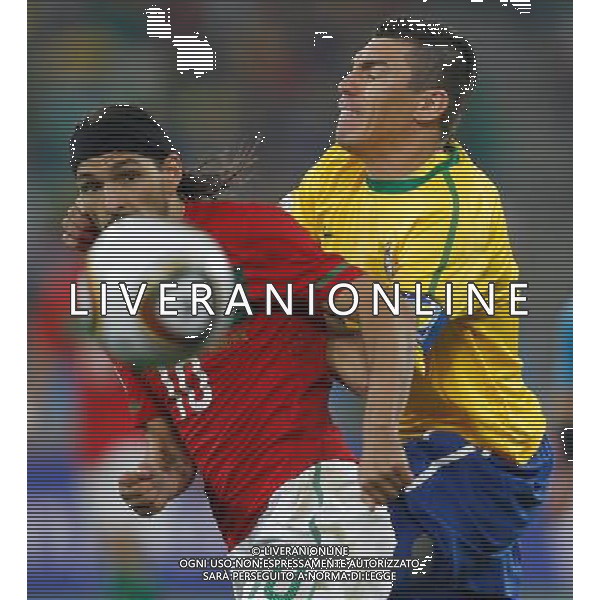 (100625) -- DURBAN, June 25, 2010 -- Brazil\'s Lucio (R) vies with Danny of Portugal during the Group G last round match at 2010 FIFA World Cup, at Moses Mabhida stadium in Durban, South Africa, on June 25, 2010. Liao Yujie) (dl) MONDIALI DI CALCIO SUDAFRICA 2010 PORTOGALLO BRASILE CALCIO SPORT ©PHOTOSHOT/ALDO LIVERANI ITALY ONLY