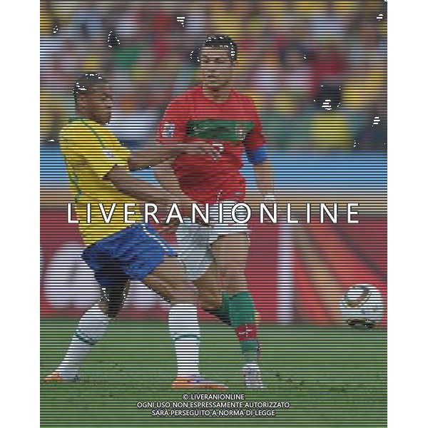 (100625) -- DURBAN, June 25, 2010 -- Cristiano Ronaldo (R) of Portugal breaks through during the Group G last round match against Brazil at 2010 FIFA World Cup, at Moses Mabhida stadium in Durban, South Africa, on June 25, 2010. Chen Haitong) (dl) MONDIALI DI CALCIO SUDAFRICA 2010 PORTOGALLO BRASILE CALCIO SPORT ©PHOTOSHOT/ALDO LIVERANI ITALY ONLY