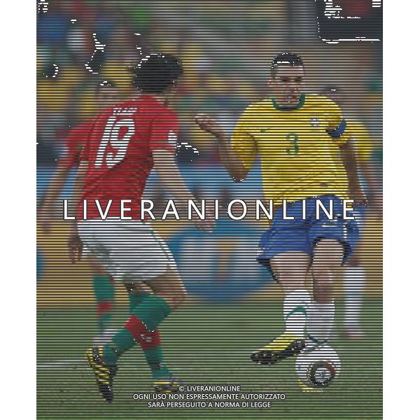 (100625) -- DURBAN, June 25, 2010 -- Brazil\'s Lucio (R) vies with Tiago of Portugal during the Group G last round match at 2010 FIFA World Cup, at Moses Mabhida stadium in Durban, South Africa, on June 25, 2010. Liao Yujie) (dl) MONDIALI DI CALCIO SUDAFRICA 2010 PORTOGALLO BRASILE CALCIO SPORT ©PHOTOSHOT/ALDO LIVERANI ITALY ONLY