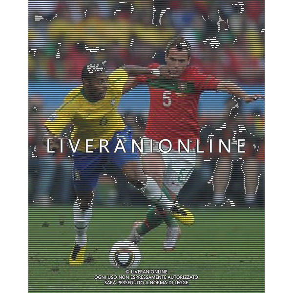 (100625) -- DURBAN, June 25, 2010 -- Brazil\'s Michel Bastos (L) vies with Duda of Portugal during the Group G last round match at 2010 FIFA World Cup, at Moses Mabhida stadium in Durban, South Africa, on June 25, 2010. Chen Haitong) (dl) MONDIALI DI CALCIO SUDAFRICA 2010 PORTOGALLO BRASILE CALCIO SPORT ©PHOTOSHOT/ALDO LIVERANI ITALY ONLY