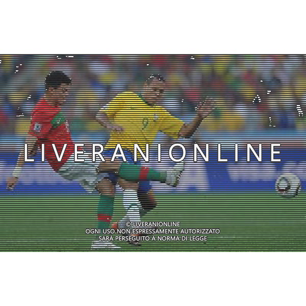 (100625) -- DURBAN, June 25, 2010 -- Brazil\'s MLuis Fabiano (R) vies with Pepe of Portugal during the Group G last round match at 2010 FIFA World Cup, at Moses Mabhida stadium in Durban, South Africa, on June 25, 2010. Chen Haitong) (dl) MONDIALI DI CALCIO SUDAFRICA 2010 PORTOGALLO BRASILE CALCIO SPORT ©PHOTOSHOT/ALDO LIVERANI ITALY ONLY