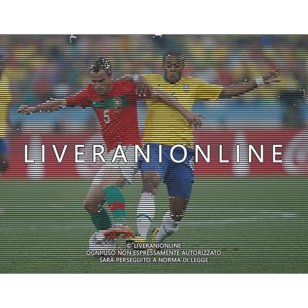 (100625) -- DURBAN, June 25, 2010 -- Brazil\'s Michel Bastos (R) vies with Duda of Portugal during the Group G last round match at 2010 FIFA World Cup, at Moses Mabhida stadium in Durban, South Africa, on June 25, 2010. Liao Yujie) (dl) MONDIALI DI CALCIO SUDAFRICA 2010 PORTOGALLO BRASILE CALCIO SPORT ©PHOTOSHOT/ALDO LIVERANI ITALY ONLY